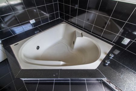 Casa de condomínio à venda com 360m², 4 quartos e 4 vagasBanheiro da Suíte 1