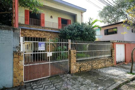 Casa à venda com 250m², 6 quartos e 2 vagasFachada + plaquinha