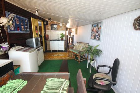 Casa à venda com 100m², 2 quartos e 3 vagasVaranda da Sala 1