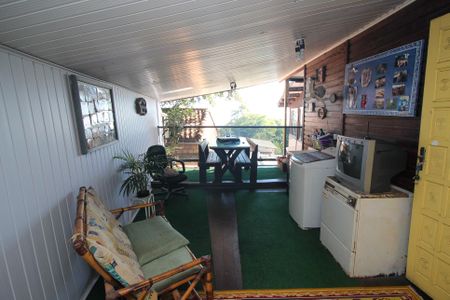 Casa à venda com 100m², 2 quartos e 3 vagasVaranda da Sala 1