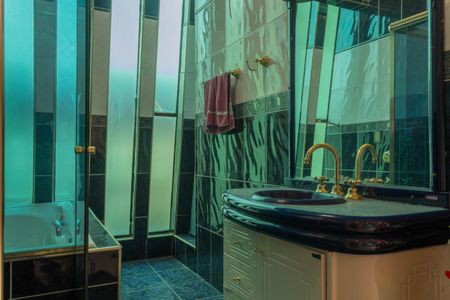 Casa à venda com 210m², 3 quartos e 4 vagasBanheiro da Suíte 1