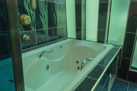 Casa à venda com 210m², 3 quartos e 4 vagasBanheiro da Suíte 1