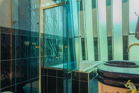 Casa à venda com 210m², 3 quartos e 4 vagasBanheiro da Suíte 1