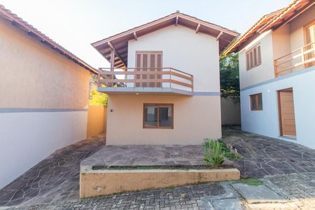 Casa de condomínio à venda com 130m², 2 quartos e 2 vagas Casa de condomínio à venda com 130m², 2 quartos e 2 vagasFachada
