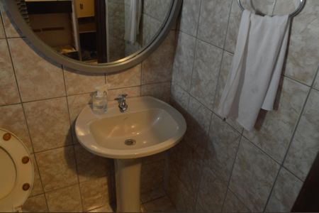 Casa à venda com 400m², 4 quartos e 5 vagas Casa à venda com 400m², 4 quartos e 5 vagasBanheiro de Serviço