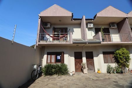 Casa de condomínio à venda com 82m², 2 quartos e 1 vagaFachada e placa