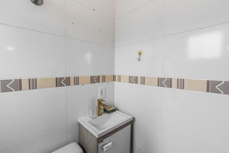 Casa de condomínio à venda com 74m², 2 quartos e 1 vagaBanheiro da Sutie 1