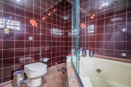 Casa à venda com 336m², 4 quartos e 4 vagasBanheiro da Suíte 1