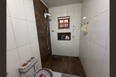 Casa à venda com 128m², 2 quartos e 2 vagas Casa à venda com 128m², 2 quartos e 2 vagasBanheiro