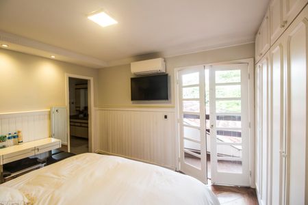 Casa de condomínio à venda com 540m², 4 quartos e 6 vagas Casa de condomínio à venda com 540m², 4 quartos e 6 vagasSuíte 1