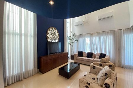 Casa de condomínio à venda com 410m², 3 quartos e 4 vagas Casa de condomínio à venda com 410m², 3 quartos e 4 vagasSala