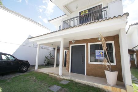 Casa de condomínio à venda com 174m², 4 quartos e 2 vagasFachada e placa