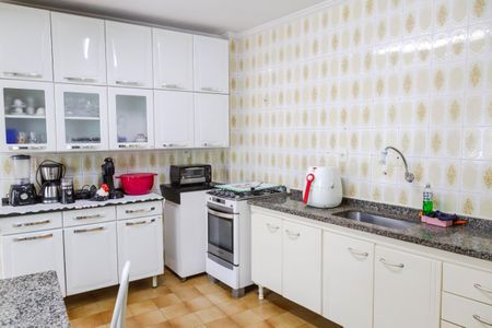 Casa à venda com 279m², 4 quartos e 4 vagas Casa à venda com 279m², 4 quartos e 4 vagasCozinha