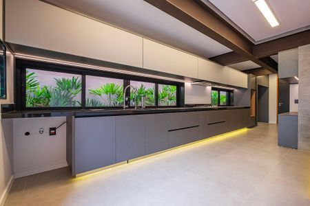 Casa à venda com 450m², 5 quartos e 4 vagasSala/Cozinha