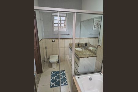 Casa de condomínio à venda com 188m², 3 quartos e 2 vagasBanheiro 1