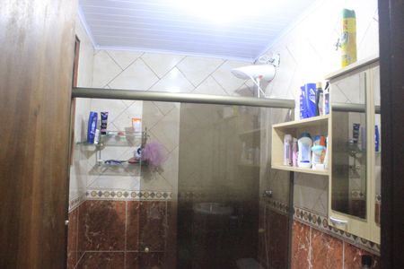 Casa à venda com 315m², 4 quartos e 6 vagasBanheiro da Suíte 1