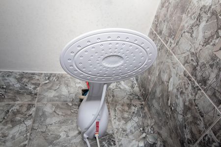 Casa à venda com 180m², 2 quartos e 2 vagasBanheiro da Suíte 1