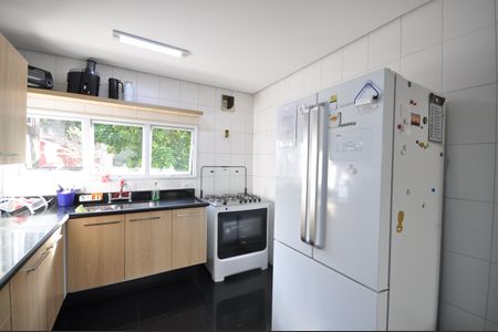 Casa de condomínio para alugar com 240m², 4 quartos e 3 vagasCozinha