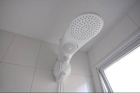 Casa de condomínio para alugar com 240m², 4 quartos e 3 vagasBanheiro da Suíte 2