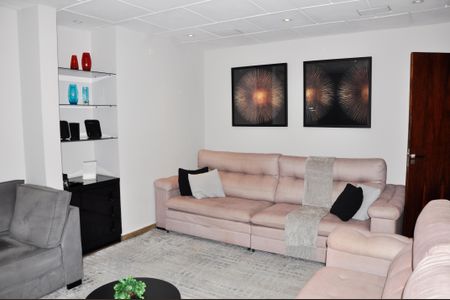 Casa à venda com 320m², 3 quartos e 4 vagasDetalhe - Sala de TV