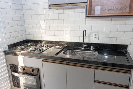 Apartamento à venda com 44m², 2 quartos e 1 vaga Apartamento à venda com 44m², 2 quartos e 1 vagaCozinha e Área de Serviço