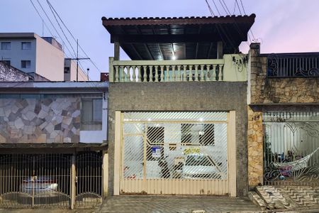 Casa à venda com 125m², 3 quartos e 2 vagas Casa à venda com 125m², 3 quartos e 2 vagasFachada e Placa