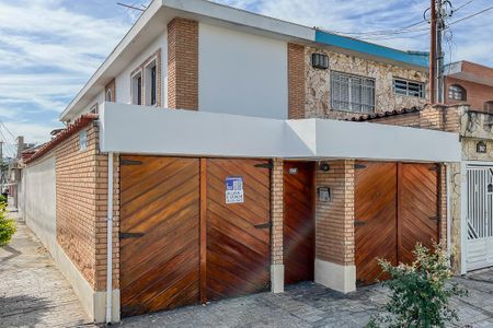 Casa à venda com 200m², 4 quartos e 3 vagasFachada + plaquinha