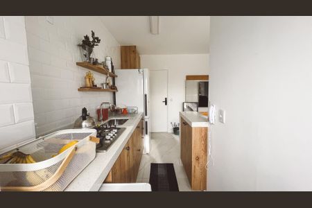 Apartamento à venda com 44m², 2 quartos e 1 vaga Apartamento à venda com 44m², 2 quartos e 1 vagaCozinha e Área de Serviço