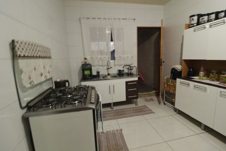Casa à venda com 115m², 4 quartos e 3 vagas Casa à venda com 115m², 4 quartos e 3 vagasCozinha