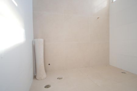 Casa de condomínio à venda com 58m², 2 quartos e 1 vagaBanheiro da Suíte 2