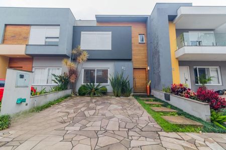 Casa de condomínio à venda com 157m², 3 quartos e 2 vagas Casa de condomínio à venda com 157m², 3 quartos e 2 vagasFachada