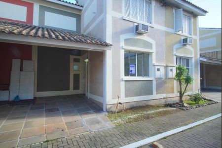 Casa de condomínio à venda com 84m², 3 quartos e 2 vagasFachada e Placa