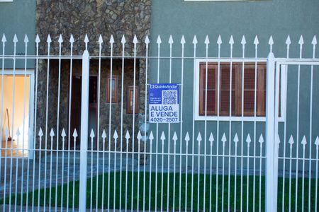 Casa à venda com 294m², 4 quartos e 2 vagas Casa à venda com 294m², 4 quartos e 2 vagasFachada e placa