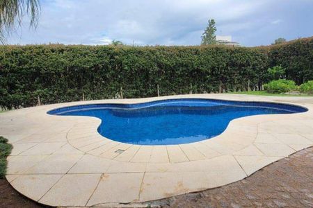 Casa de condomínio à venda com 338m², 5 quartos e 6 vagas