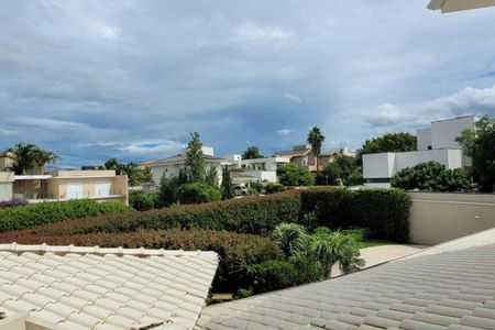 Casa de condomínio à venda com 338m², 5 quartos e 6 vagas