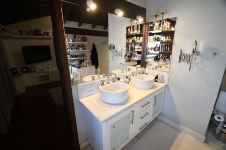 Casa de condomínio à venda com 470m², 4 quartos e 2 vagasBanheiro 1 - Suíte