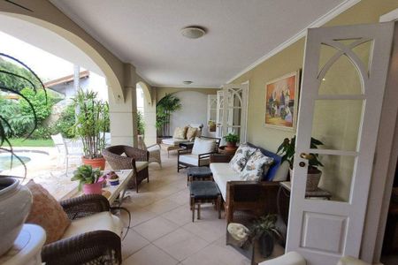 Casa de condomínio à venda com 387m², 4 quartos e 4 vagas