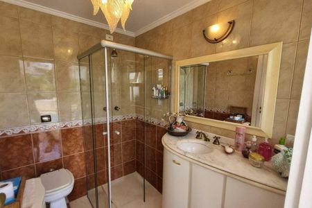 Casa de condomínio à venda com 387m², 4 quartos e 4 vagas