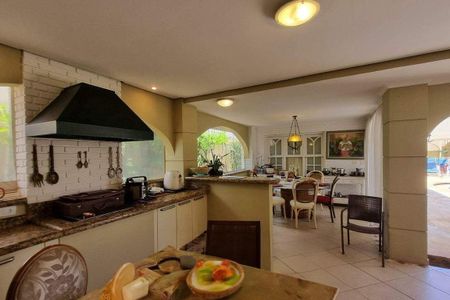 Casa de condomínio à venda com 387m², 4 quartos e 4 vagas