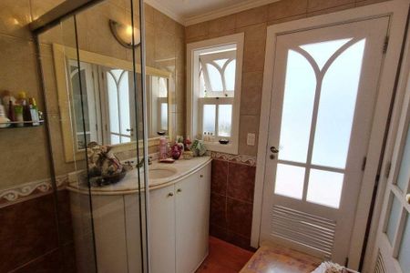 Casa de condomínio à venda com 387m², 4 quartos e 4 vagas