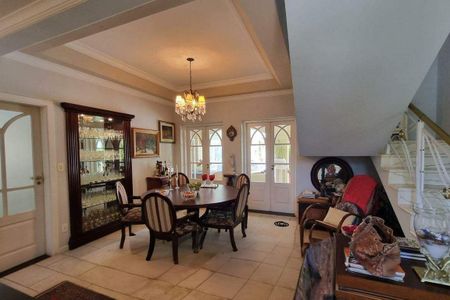 Casa de condomínio à venda com 387m², 4 quartos e 4 vagas