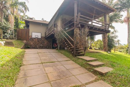 Casa de condomínio à venda com 249m², 3 quartos e 4 vagas Casa de condomínio à venda com 249m², 3 quartos e 4 vagasFachada