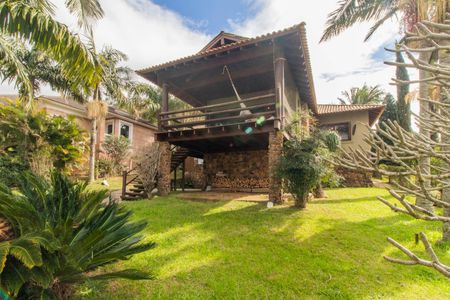 Casa de condomínio à venda com 249m², 3 quartos e 4 vagas Casa de condomínio à venda com 249m², 3 quartos e 4 vagasFachada
