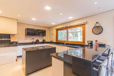 Casa de condomínio à venda com 249m², 3 quartos e 4 vagas Casa de condomínio à venda com 249m², 3 quartos e 4 vagasCozinha e Área de Serviço