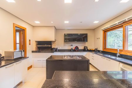 Casa de condomínio à venda com 249m², 3 quartos e 4 vagas Casa de condomínio à venda com 249m², 3 quartos e 4 vagasCozinha e Área de Serviço