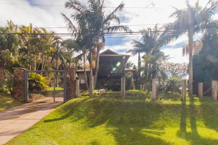 Casa de condomínio à venda com 249m², 3 quartos e 4 vagas Casa de condomínio à venda com 249m², 3 quartos e 4 vagasFachada