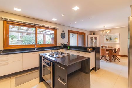 Casa de condomínio à venda com 249m², 3 quartos e 4 vagas Casa de condomínio à venda com 249m², 3 quartos e 4 vagasCozinha e Área de Serviço