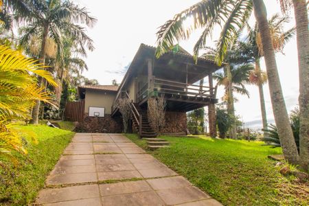 Casa de condomínio à venda com 249m², 3 quartos e 4 vagas Casa de condomínio à venda com 249m², 3 quartos e 4 vagasFachada