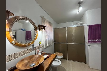 Casa à venda com 265m², 4 quartos e 2 vagasBanheiro suíte 3