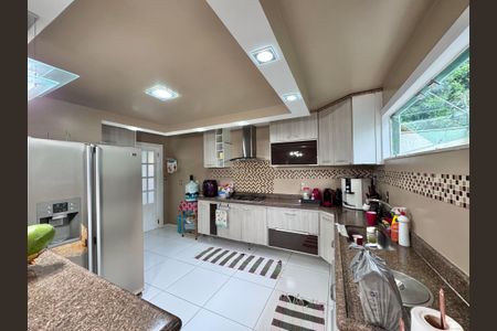 Casa de condomínio à venda com 280m², 4 quartos e 3 vagas Casa de condomínio à venda com 280m², 4 quartos e 3 vagasCozinha